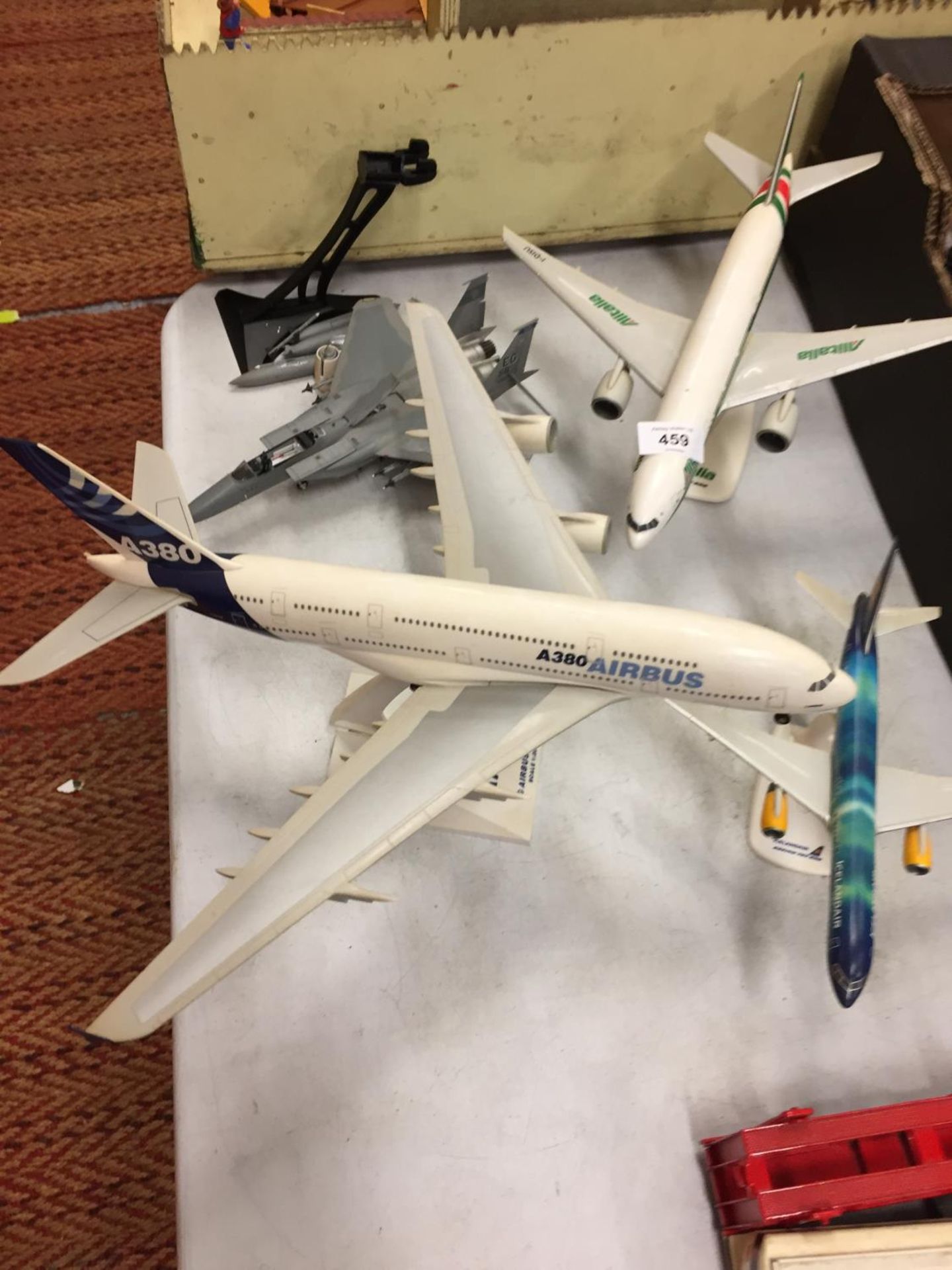 FOUR MODEL AIRPLANES WITH STANDS TO INCLUDE AN AIRBUS ETC