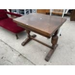 AN EARLY 20TH CENTURY OAK FOLD-OVER DINING/WORK TABLE