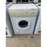 A WHITE CREDA TUMBLE DRYER BELIEVED IN WORKING ORDER BUT NO WARRANTY