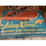 A VINTAGE TOPPER TOYS JOHNNY SPEED E-TYPE JAGUAR MODEL CAR TO INCLUDE THE ORIGINAL DRIVER AND BOX