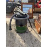 AN AQUA VAC WET AND DRY VACUUM