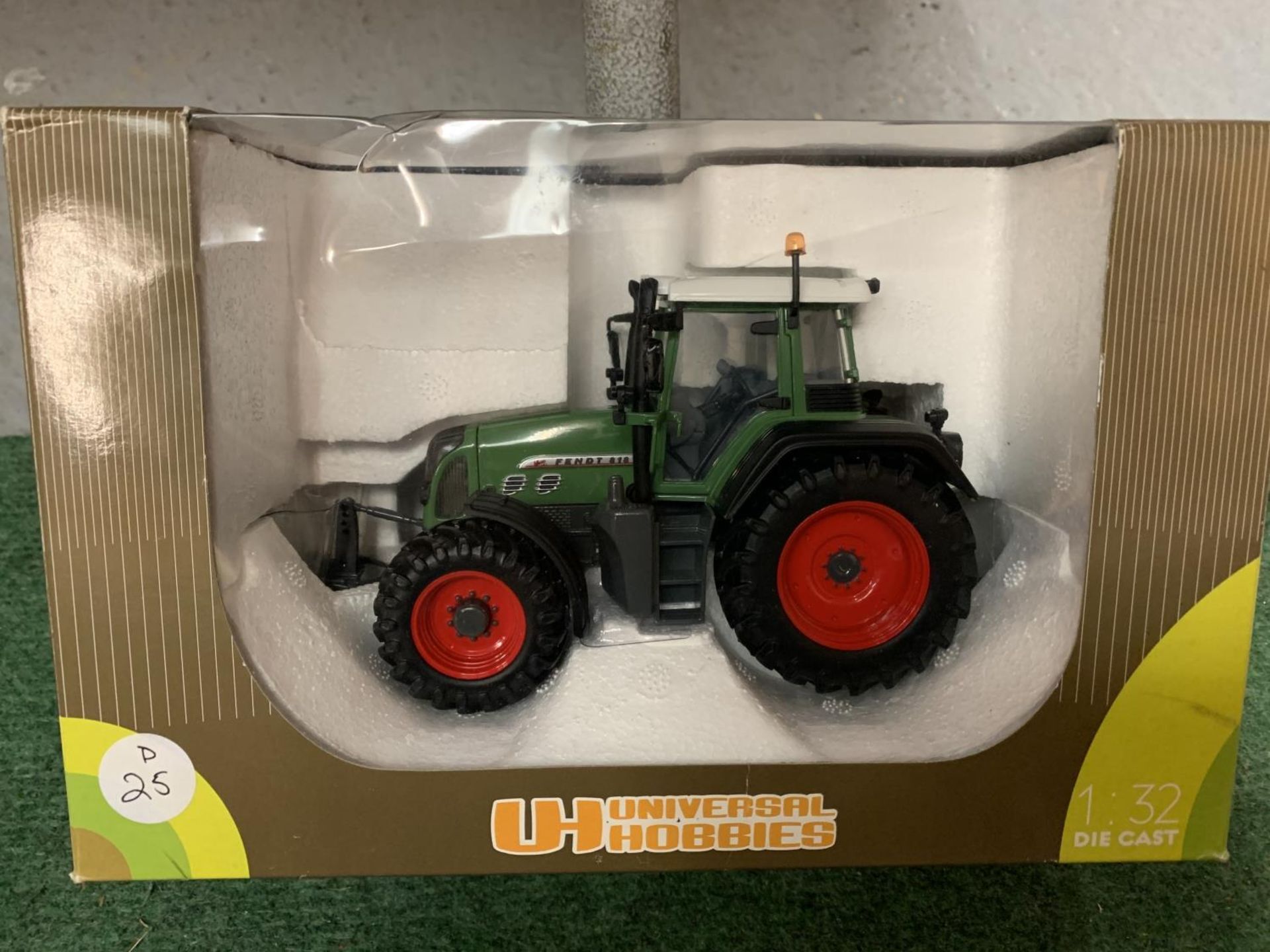 A BOXED UNIVERSAL HOBBIES FENDT 818 VARIO TRACTOR