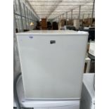 A WHITE FAIRLINE COUNTER TOP FREEZER