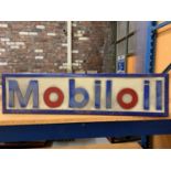 AN ILLUMINATED 'MOBIL OIL ' SIGN