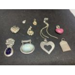 TEN SILVER PENDANTS