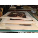 A PORTFOLIO OF VARIOUS PRINTS SOME BEING MOUNTED FOR FRAMING