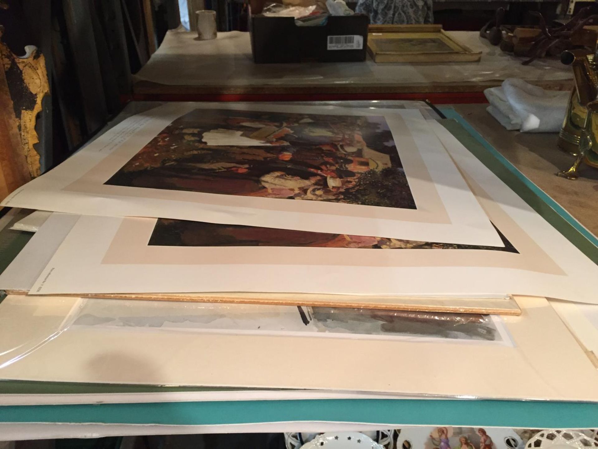 A PORTFOLIO OF VARIOUS PRINTS SOME BEING MOUNTED FOR FRAMING
