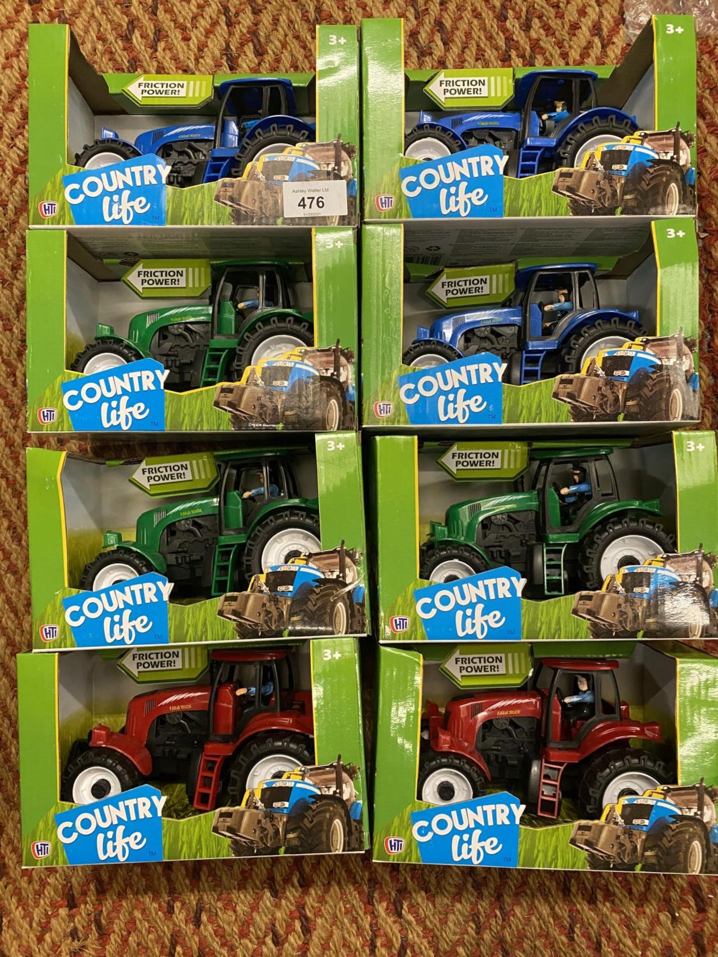 EIGHT BOXED HTI COUNTRY LIFE FRICTION POWER TRACTORS