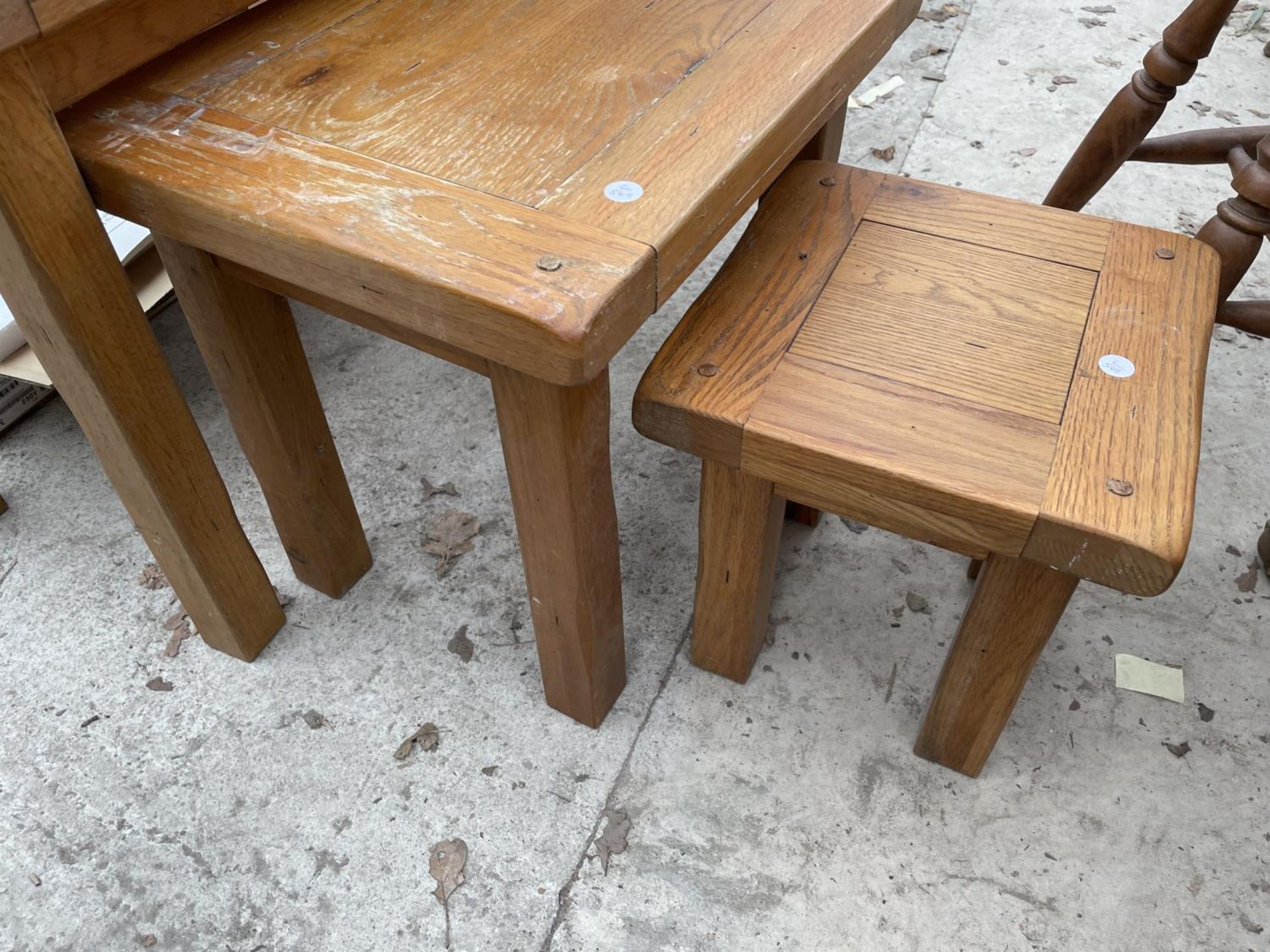 A MODERN OAK NEST OF THREE TABLES - Image 3 of 3