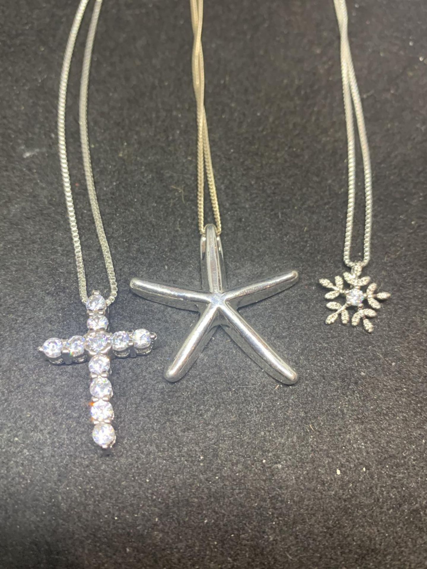 SIX SILVER NECKLACES WITH PENDANTS TO INCLUDE CLEAR STONE FLOWERS, CROSS ETC - Image 3 of 3