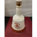 A BELLS DECANTER TO COMMEMORATE THE BIRTH OF PRINCE HENRY OF WALES 1984