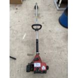 A HOMELITE PETROL GRASS STRIMMER