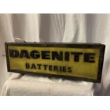 AN ILLUMINATED 'DAGENITE BATTERIES' SIGN