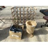 A TREEN URN, A 36 BOTTLE WINE RACK, TORCH ETC