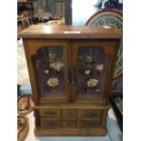 A WOODEN JEWELLERY CABINET IN THE FORM OF A MINIATURE DRESSER