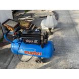 AN AIRMASTER AIR COMPRESSOR