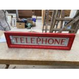 A VINTAGE STYLE TELEPHONE BOX SIGN