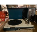 A VINTAGE PHILIPS PORTABLE RECORD PLAYER