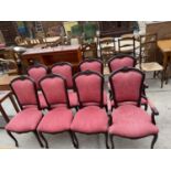 A SET OF SIX VICTORIAN STYLE UPHOLSTERED DINING CHAIRS (TWO CARVERS)