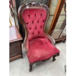 A VICTORIAN STYLE SPOON-BACK CHAIR WITH BUTTON BACK