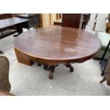 A VICTORIAN STYLE HARDWOOD CIRCULAR DINING/LOBBY TABLE, 58" DIAMETER, ON TURNED AND CARVED CENTRAL