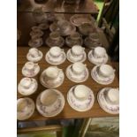 A COLLECTION OF WEDGWOOD AND COALPORT CHINA TO INCLUDE TRIOSM COFFE CUPS AND SAUCERS ETC