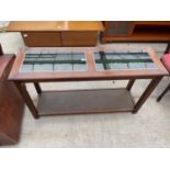 A MODERN MAHOGANY TRINKET DISPLAY TABLE WITH SUNKEN GREEN BAIZE COMPARTMENTS