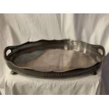 A LARGE SILVER PLATED TWIN HANDLED BUTLER'S TRAY L: 56CM
