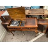 A DYNATRON STEREO SYSTEM WITH GARRARD DECK, IN WALNUT CASE TOGETHER WITH TWO SPEAKERS