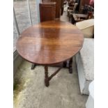 AN 18TH CENTURY STYLE OAK GATE LEG TABLE ON TURNED LEGS 66" X 42"