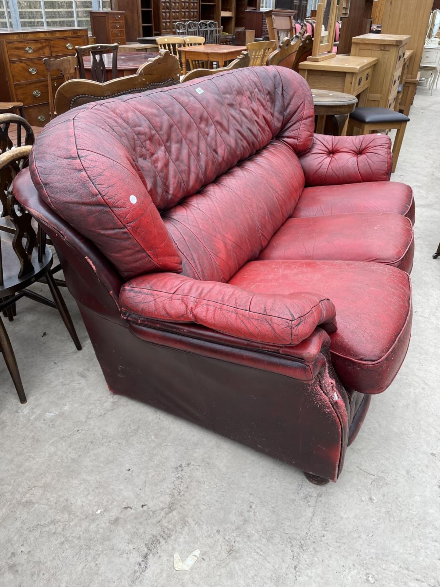 AN OXBLOOD THREE SEATER SETTEE - Image 4 of 7