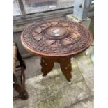 A CARVED ASIAN HARDWOOD TABLE DIAMETER: 14.5 INCHES
