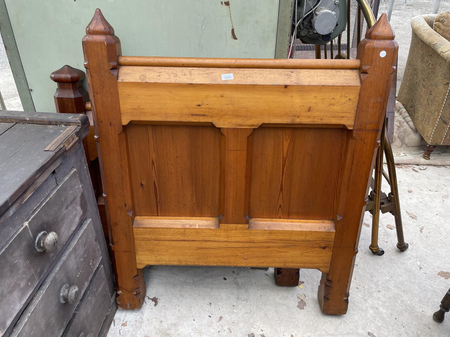 A VICTORIAN PITCH PINE THREE FOOT BED HEAD AND FOOT