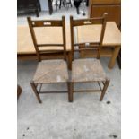 A PAIR OF OAK RUSH SEATED BEDROOM CHAIRS