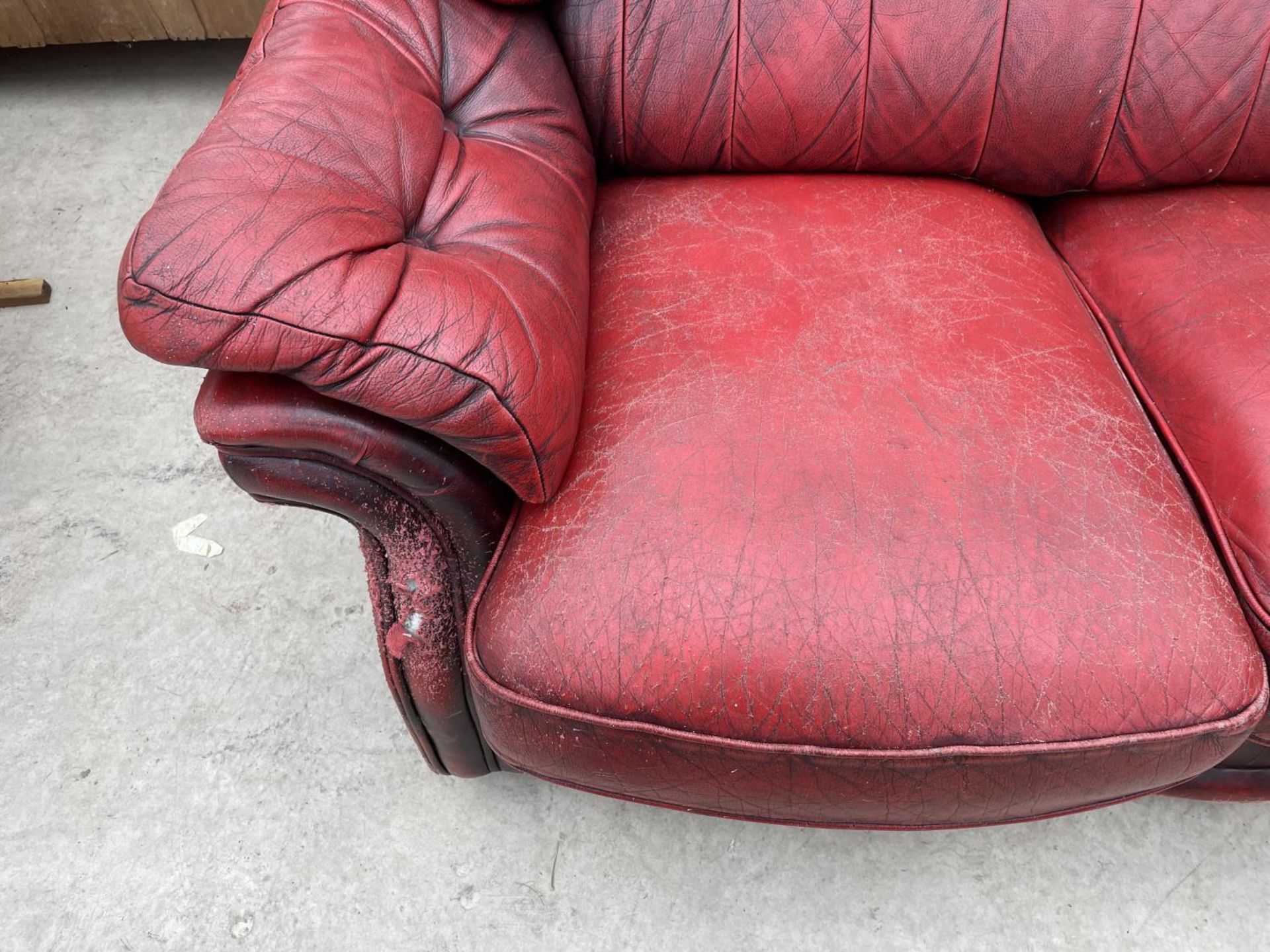 AN OXBLOOD THREE SEATER SETTEE - Image 3 of 7