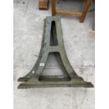 A PAIR OF HEAVY CAST IRON TABLE BASE LEGS