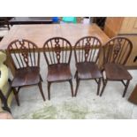 FOUR ELM AND BEECH WHEEL-BACK WINDSOR CHAIRS STAMPED F-184