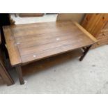 AN OAK ART NOUVEAU STYLE TWO TIER COFFEE TABLE BY 'SHERRY' 42.5" X 23"