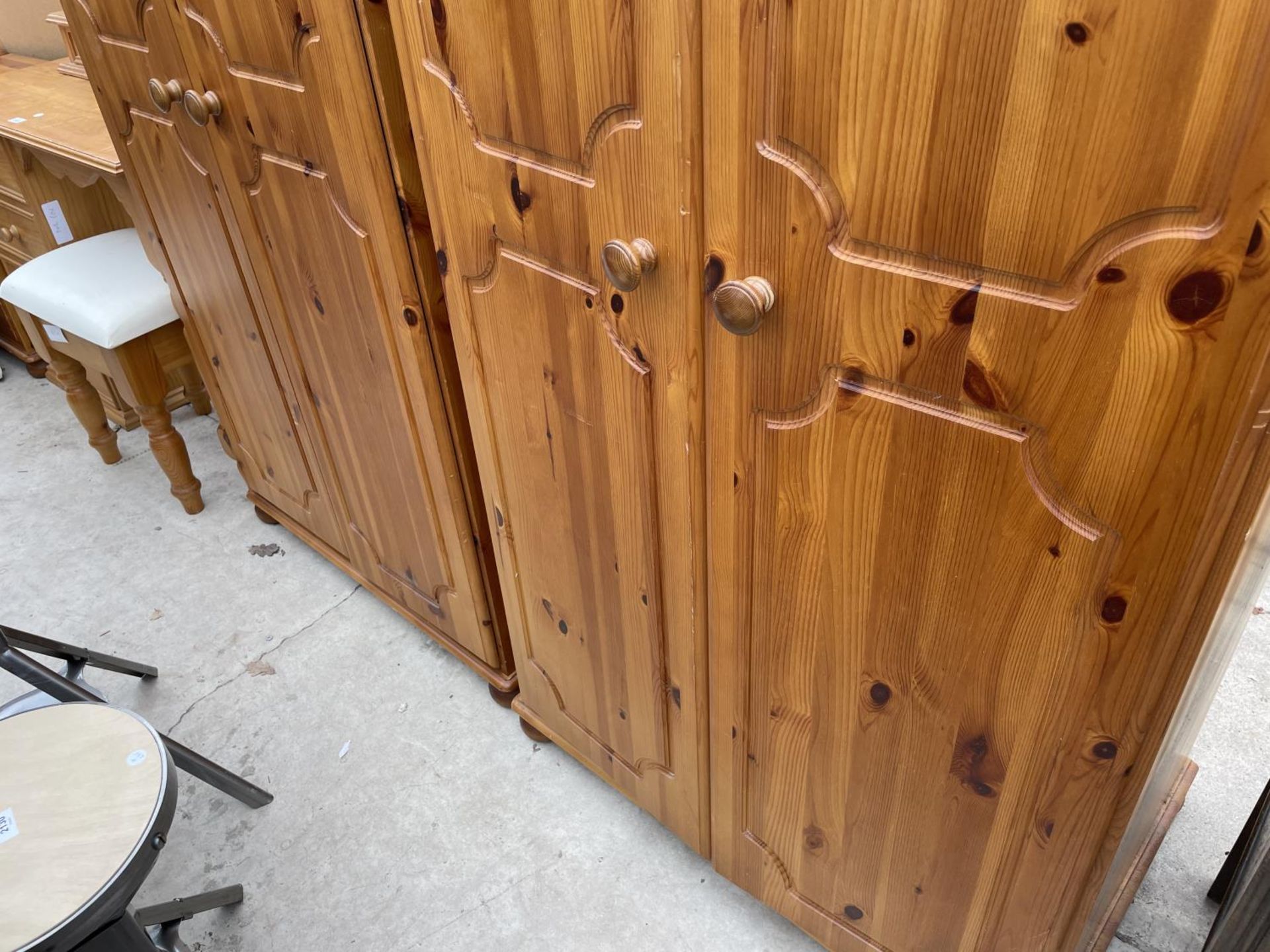A PAIR OF PINE TWO DOOR WARDROBES - Image 3 of 3