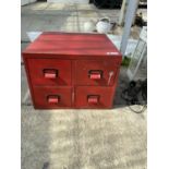 A VINTAGE MINIATURE FOUR DRAWER METAL FILING CABINET