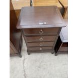 A STAG MINSTREL FOUR DRAWER CHEST, 21" WIDE
