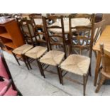 FOUR BEECH FRAMED LADDERBACK RUSH SEATED CHAIRS