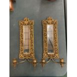 A PAIR OF MIRROR BACK BRASS DETAIL WALL SCONCES H:45CM