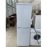 A WHITE HOTPOINT UPRIGHT FRIDGE FREEZER BELIEVED IN WORKING ORDER BUT NO WARRANTY