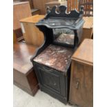 A VICTORIAN EBONISED PURDONIUMWITH MIRROR-BACK AND MARBLE TOP