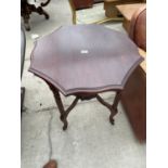 AN EDWARDIAN MAHOGANY OCTAGONAL TWO TIER CENTRE TABLE