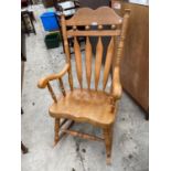 A VICTORIAN STYLE ROCKING CHAIR