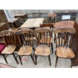 A SET OF FOUR VICTORIAN LATH-BACK KITCHEN CHAIRS