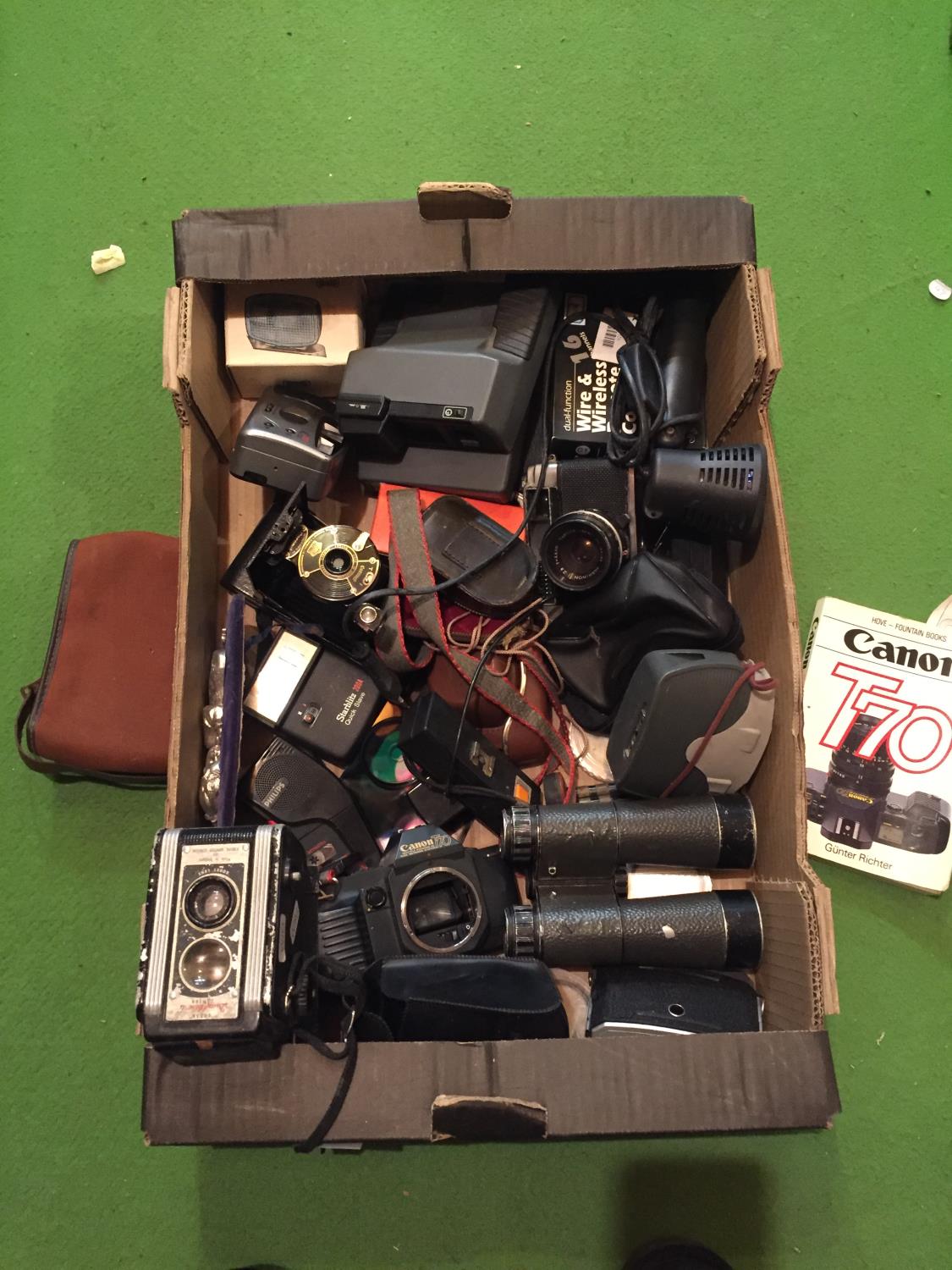 A COLLECTION OF VARIOUS CAMERAS AND EQUIPMENT