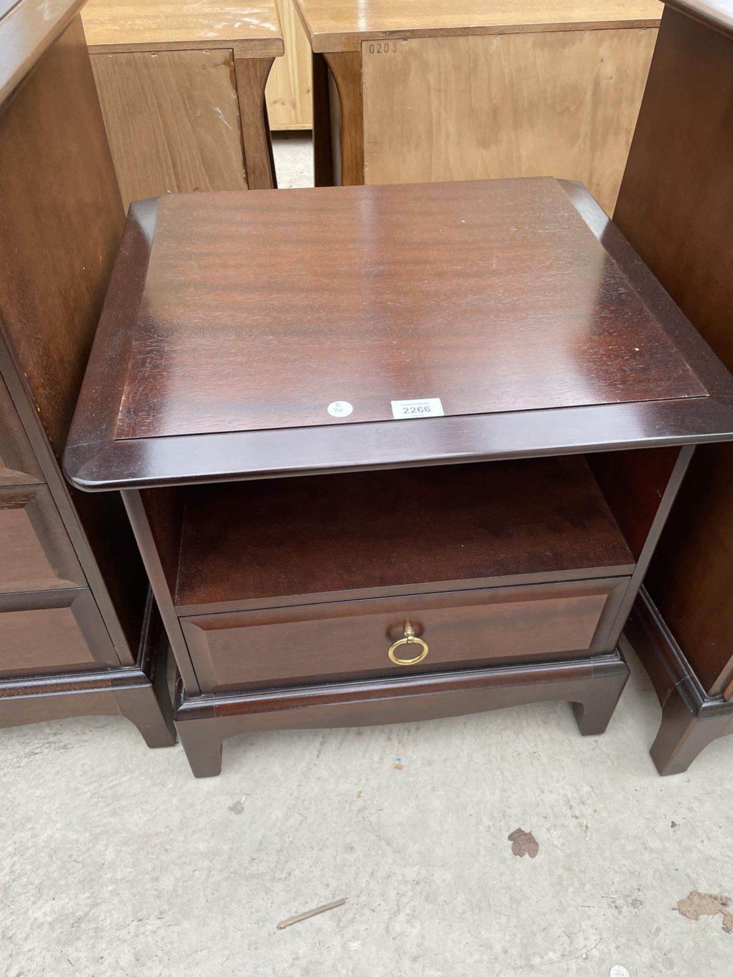 A STAG MINSTREL BEDSIDE CHEST, 21" WIDE